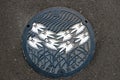 The Beauty nature pattern of JapanÃ¢â¬â¢s Manhole Cover on the sidewalk.